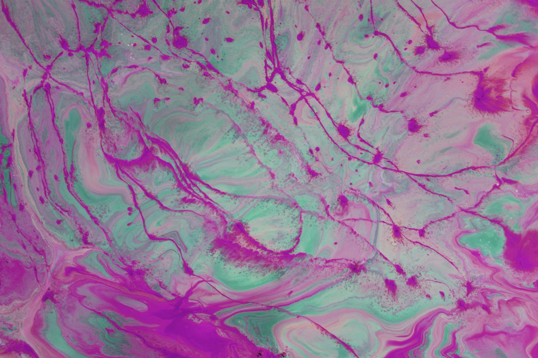 vibrant abstract fluid art with purple and green tones